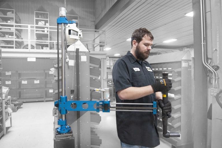 Operator running a GCI 50 Nm capacity linear slide torque reaction arm.