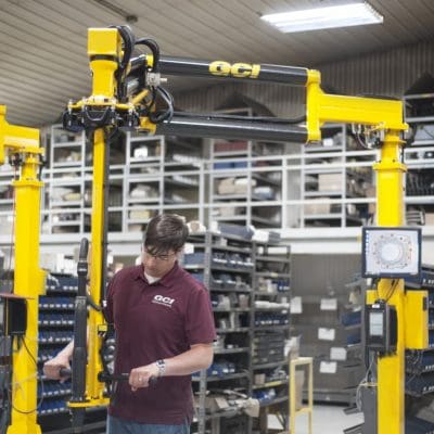 Operator running a GCI 600 Nm capacity linear slide torque reaction arm.