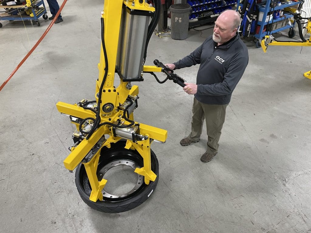 Operator with the track tire gripper