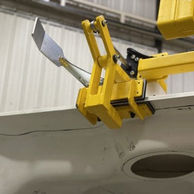 Cradle gripper with a guide rail