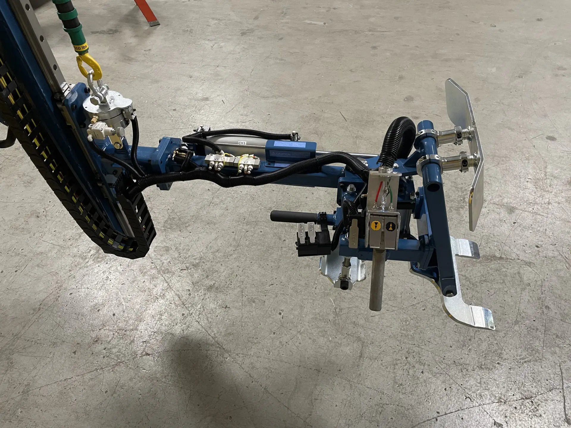 Custom end effector with a cradle gripper