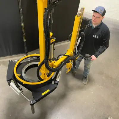 Ergonomic industrial tire manipulator for a manufacturing assembly line