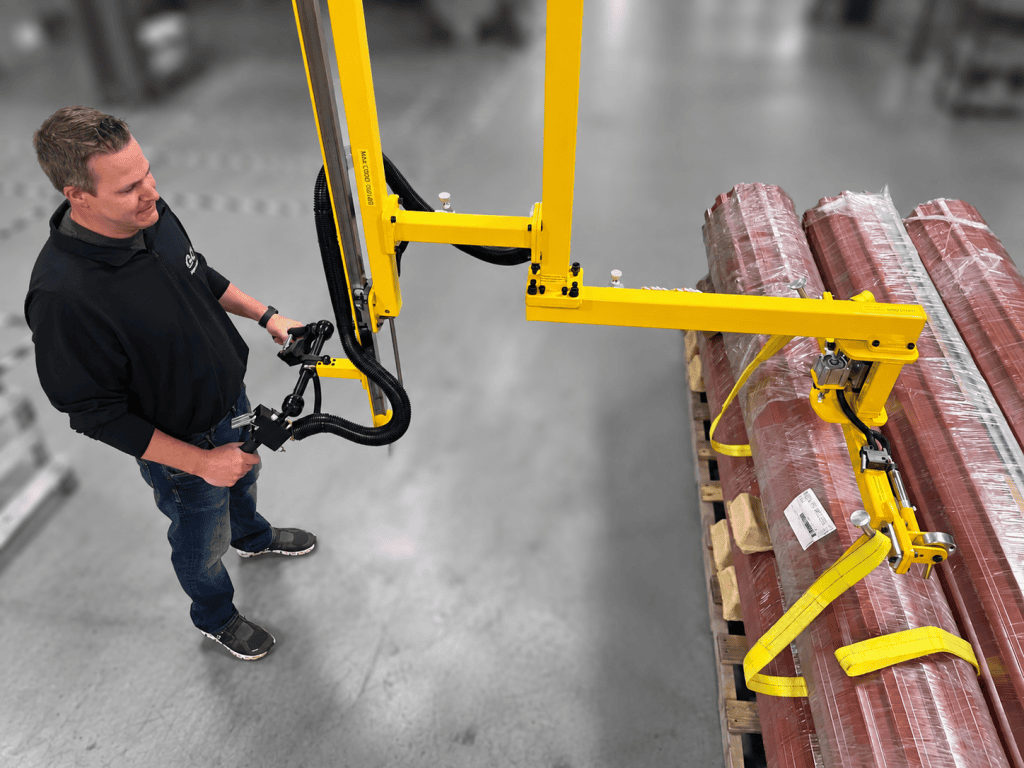 Industrial manipulator arm for handling garage doors