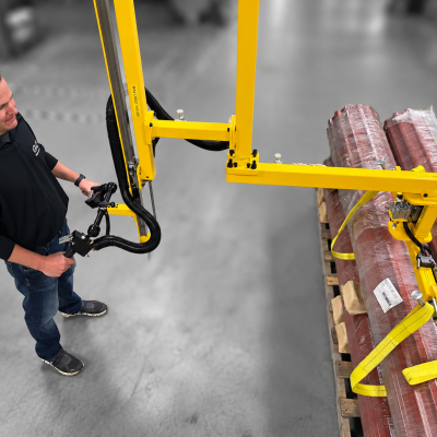 Industrial manipulator arm for handling garage doors