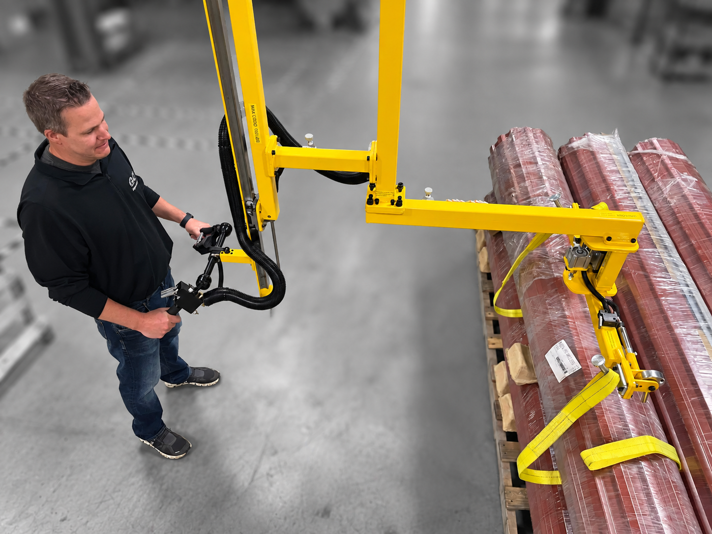 Industrial manipulator arm for handling garage doors