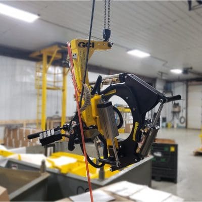 Manual roll to line up the tire and a central access hole to reach fasteners