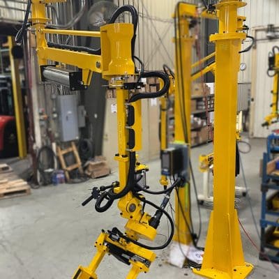 Industrial manipulator arm for handling a brake