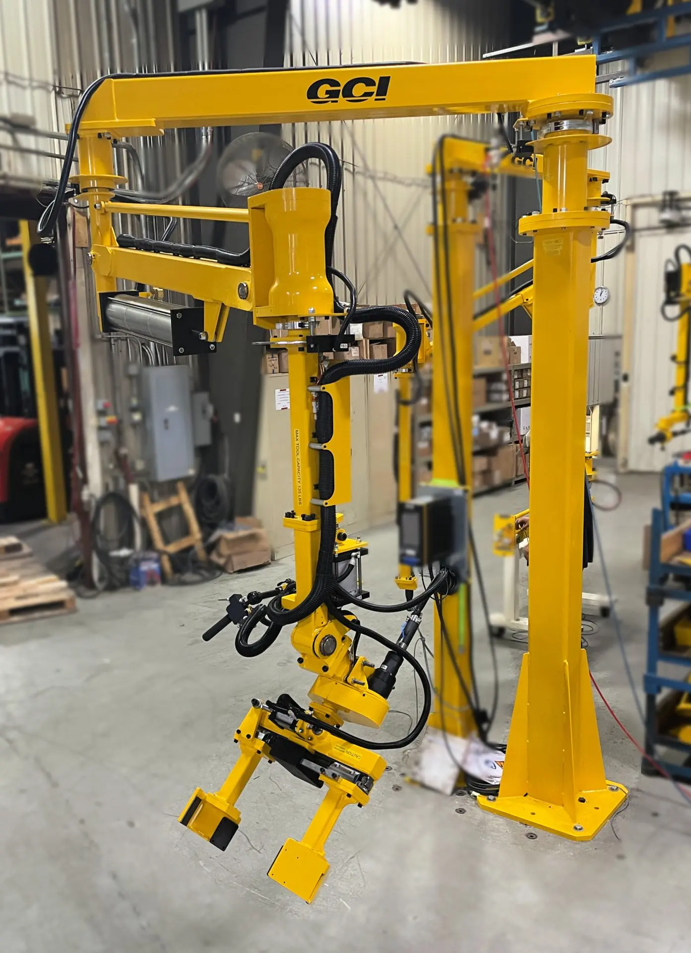 Industrial manipulator arm for handling a brake