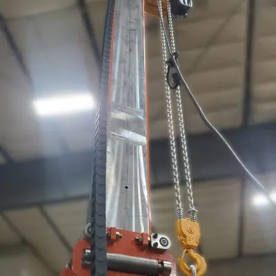 Vertical movement powered by an electric hoist