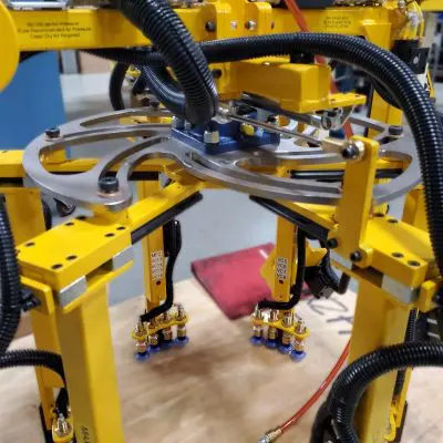 Adjustable position with needle bearings and cam followers