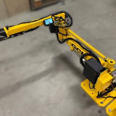 The low profile of the torque reaction arm allows it to reach under the truck