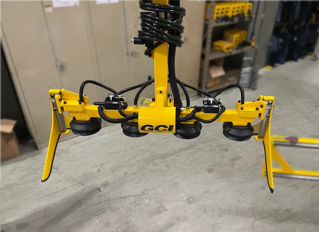 Hook-mounted tank gripper