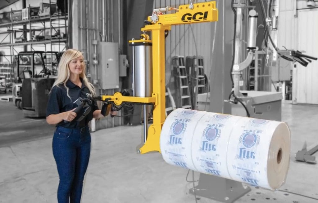 Hook-mounted roll handling manipulator