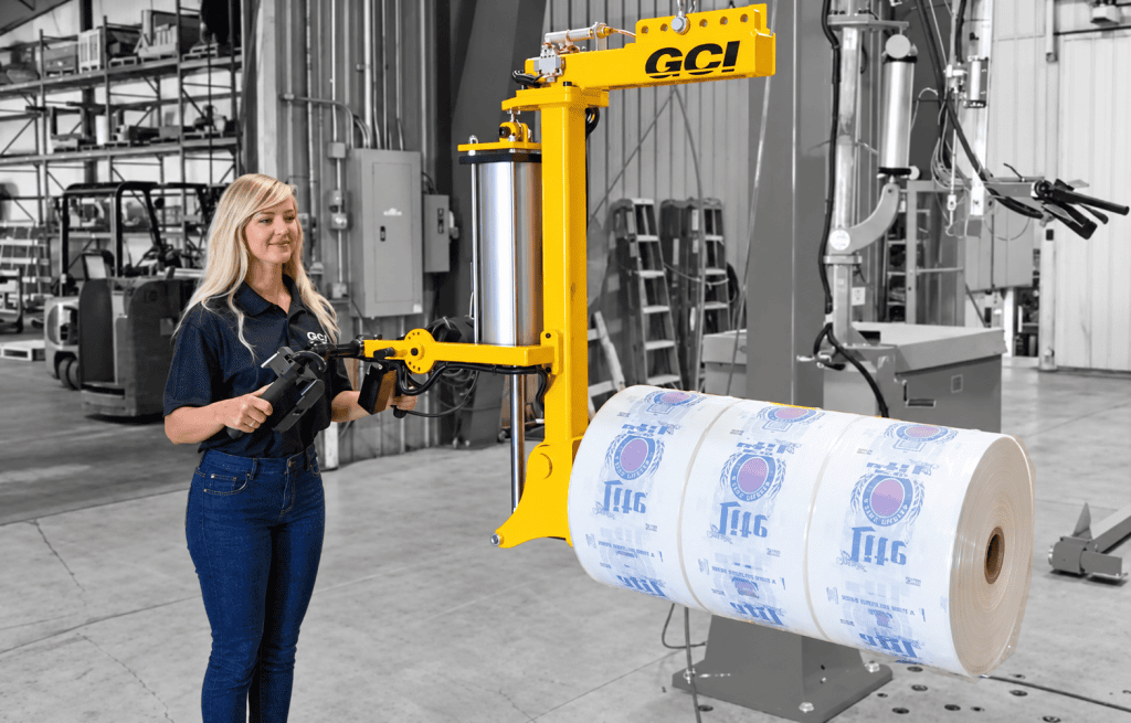 Hook mounted roll handling manipulator
