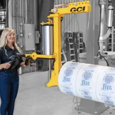 Hook-mounted roll handling manipulator