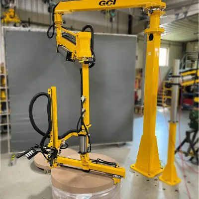 Paper roll handling manipulator arm