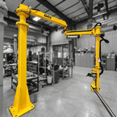 Industrial manipulator for handling roll spindles