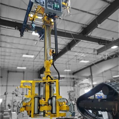 05252155-Stacker-manipulator-mounted-to-an-overhead-platform-1_